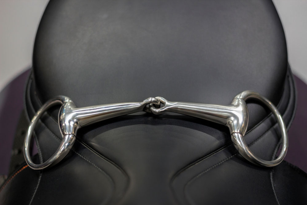 snaffle bit on black saddle