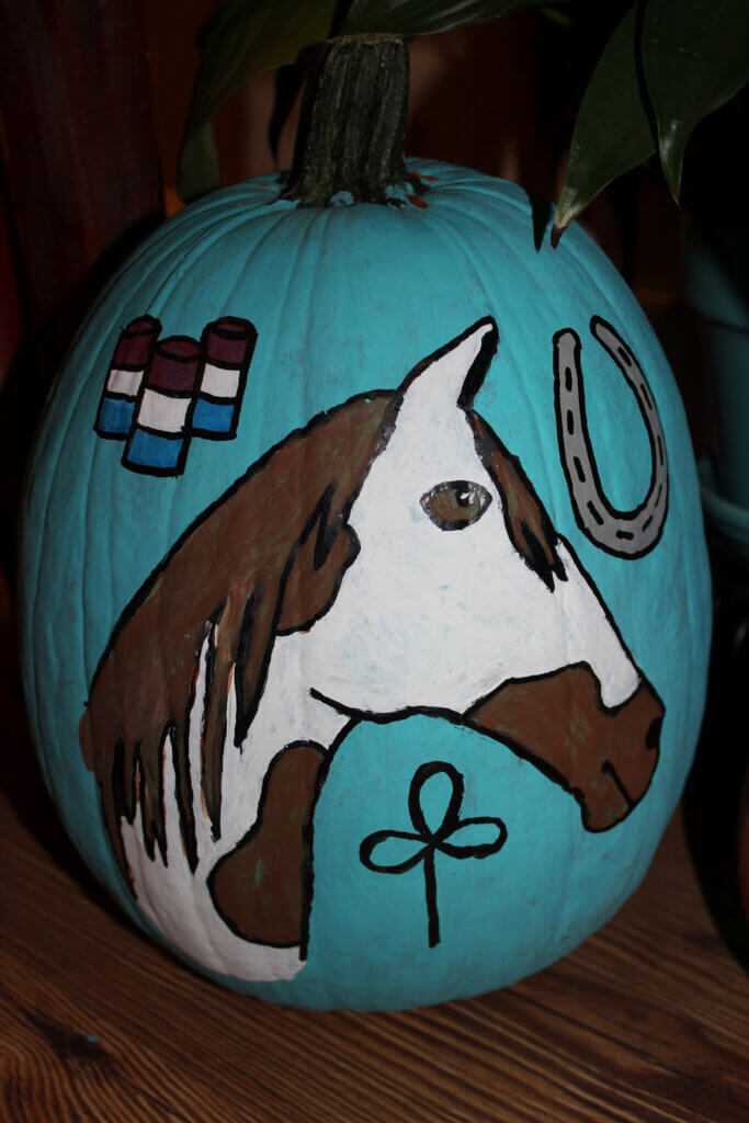 white horse with brown spots pumpkin painting